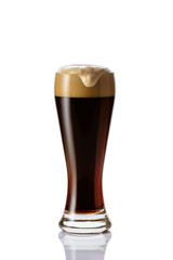 Perfect glass of dark beer with foam on white background