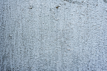 Texture of a concrete wall with cracks and scratches which can be used as a background