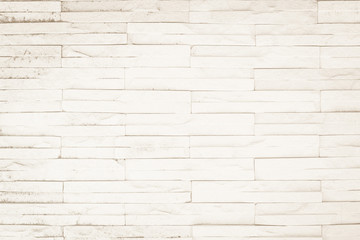 Wall cream brick wall texture background in room at subway. Brickwork stonework interior, rock old clean concrete grid uneven abstract weathered bricks tile design, horizontal architecture.