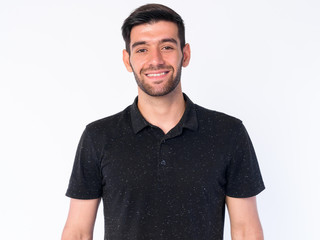 Fototapeta premium Face of happy young bearded Persian man smiling