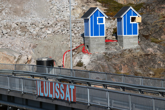 The Ilulissat signboard on the bridge of Mittarfimmut Aqq at the harbour of Ilulissat in Greenland.