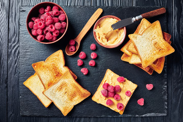 toasts with sweet peanut butter and berries