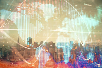 Fototapeta premium Double exposure of business theme hologram drawing and city veiw background. Concept of success.