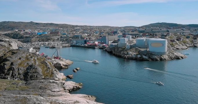 Aerial: Port in Rocky Cove by Scenic Town, Disko Bay, Greenland