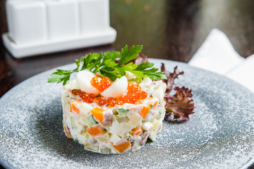 Fresh salad on ceramic plate