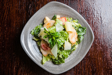 Caesar salad with fresh lettuce, parmesan and fried croutons.