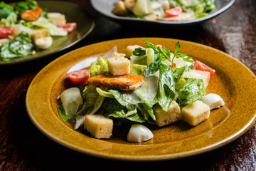 Caesar salad with fresh lettuce, parmesan and fried croutons.