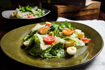 Caesar salad with fresh lettuce, parmesan and fried croutons.