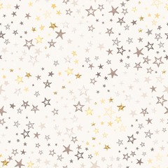 Christmas seamless pattern with doodle stars yellow, golden, beige and brown colors. Holiday vector illustration for wrapping paper, textile or wallpaper on light old background.