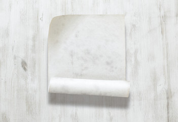 paper on wooden background