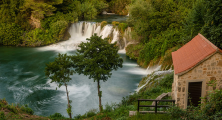 Fototapeta na wymiar waterfalls in the evening scenery at the Krka National Park in Croatia