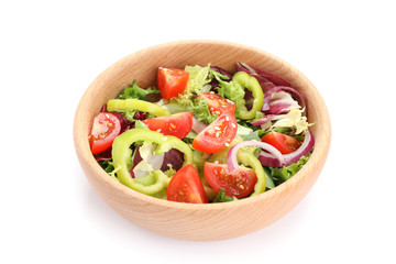 Wooden bowl with fresh salad isolated on white background