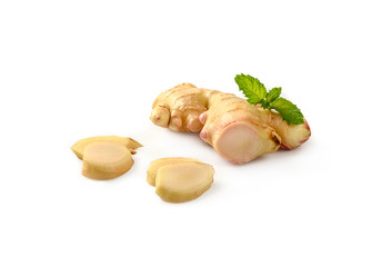 Ginger with sliced and mint leaves isolated on white background.
