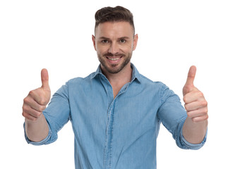 casual man standing with a ok sign gesture