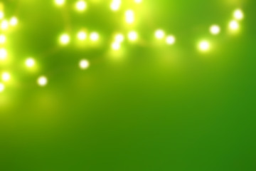 Blurred Christmas lights on color background
