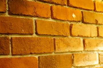 Red brick wall texture background, close up photo