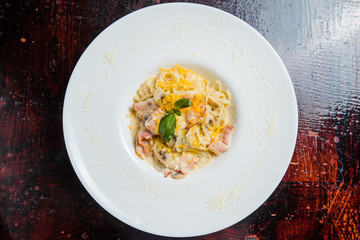Pasta in cream sauce, Italian dinner with wine
