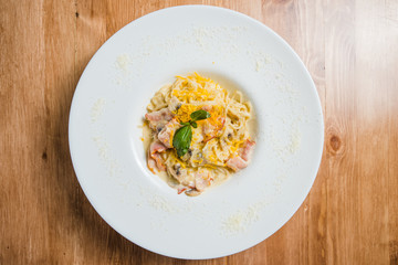 Pasta in cream sauce, Italian dinner with wine