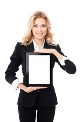 Portrait of smiling businesswoman showing blank no-name tablet pc monitor with copy space area for...