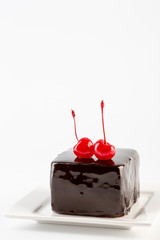 Sweet chocolate cake with cherry