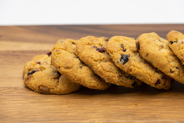 Pile of delicious tasty recipe apple cookies homemade isolated on wooden table