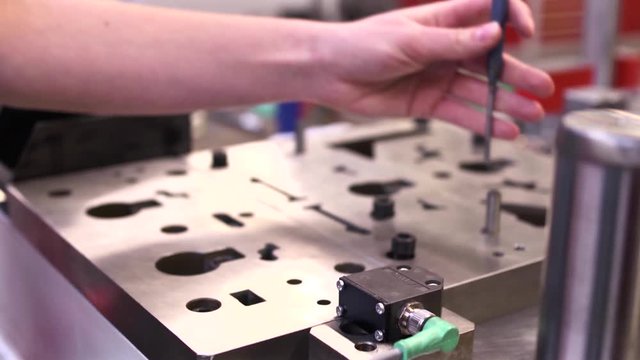 Manufacturing Small Car Parts. Service Repair Shop. Automobile Industry