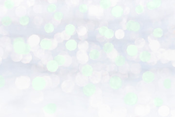Abstract christmas background, white and green bokeh