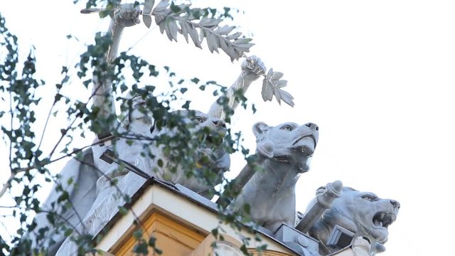 Low Angle Shot Of The Sculpture Of Dionysus In A Chariot With Lion And Tiger