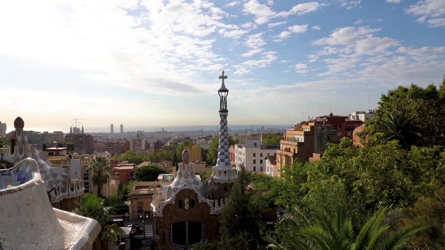 Passing mosaic of colored ceramic to get a view at Parc Guell