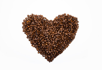 Obraz na płótnie Canvas Roasted coffee beans heart shape on white background. Love Coffee. Coffee break. Coffee Time.