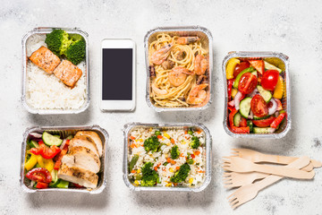 Food delivery concept - healthy lunch in boxes.