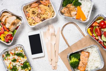Food delivery concept - healthy lunch in boxes.