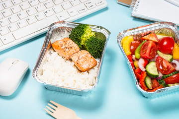 Food delivery concept - healthy lunch on office table.