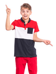 Teen boy showing helpless gesture with hands and fingers - I do not know. Cute young teenager, isolated on white background. Shrugging, confused child making helpless sign and looking at camera.