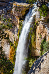 Fototapeta na wymiar Beautiful big waterfall in Spain in Catalonia, near the small village Rupit. Salt de Sallent