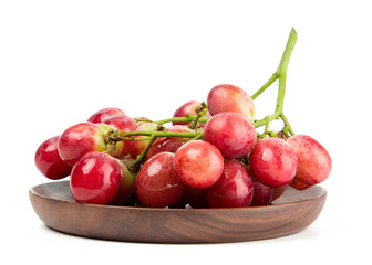 Fresh red grape isolated on white background.