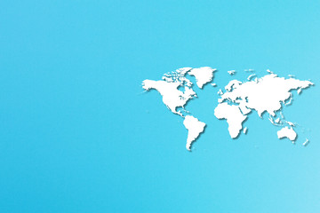 World map on blue background with copy space