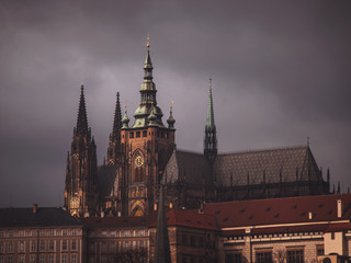 Fototapeta na wymiar View of St. Vitus Cathedral, under a dark sky.