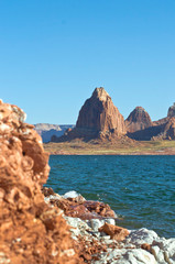 A long view of the re rock towers in the lake powell canyon bay. 
