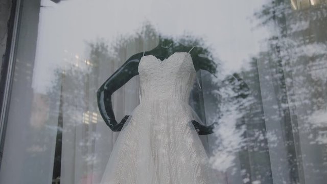 Beautiful wedding dress on a mannequin.