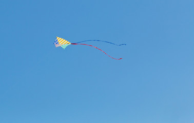 Colorful kite on a blue sky.
