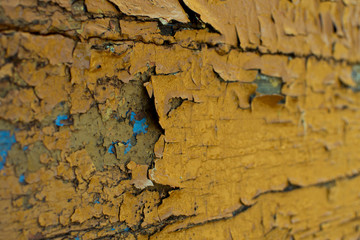 Peeling paint on the wood surface