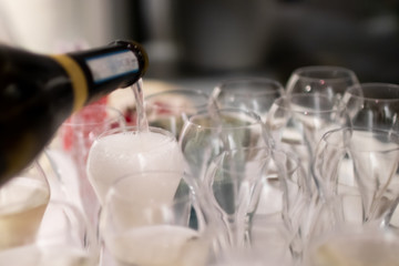 glasses of champagne on table in restaurant