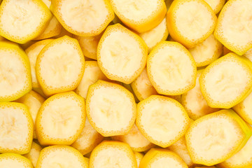 Fresh banana slices background. Top view.