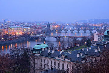 Bridges over the Vltava river in Prague, Czech Republic. Winter evening.