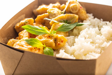 Japanese asian meal in a box of recycled paper isolated on white background.