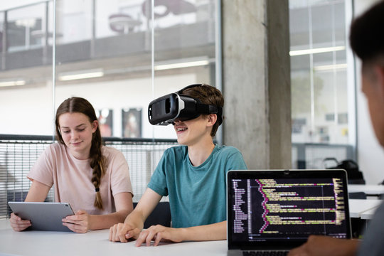 High school students using VR headset in class