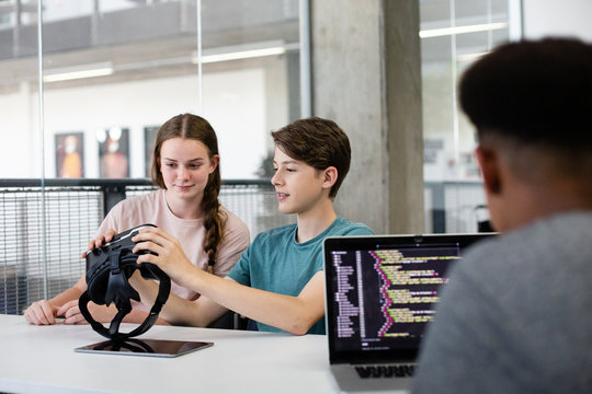 High school students using VR headset in class