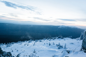 Obraz premium Beautiful snowy winter forest in the mountains