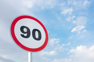Road sign on a blue sky background. Traffic sign.